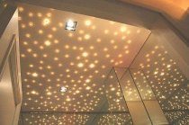 Точечные светильники могут сделать натяжной потолок волшебным